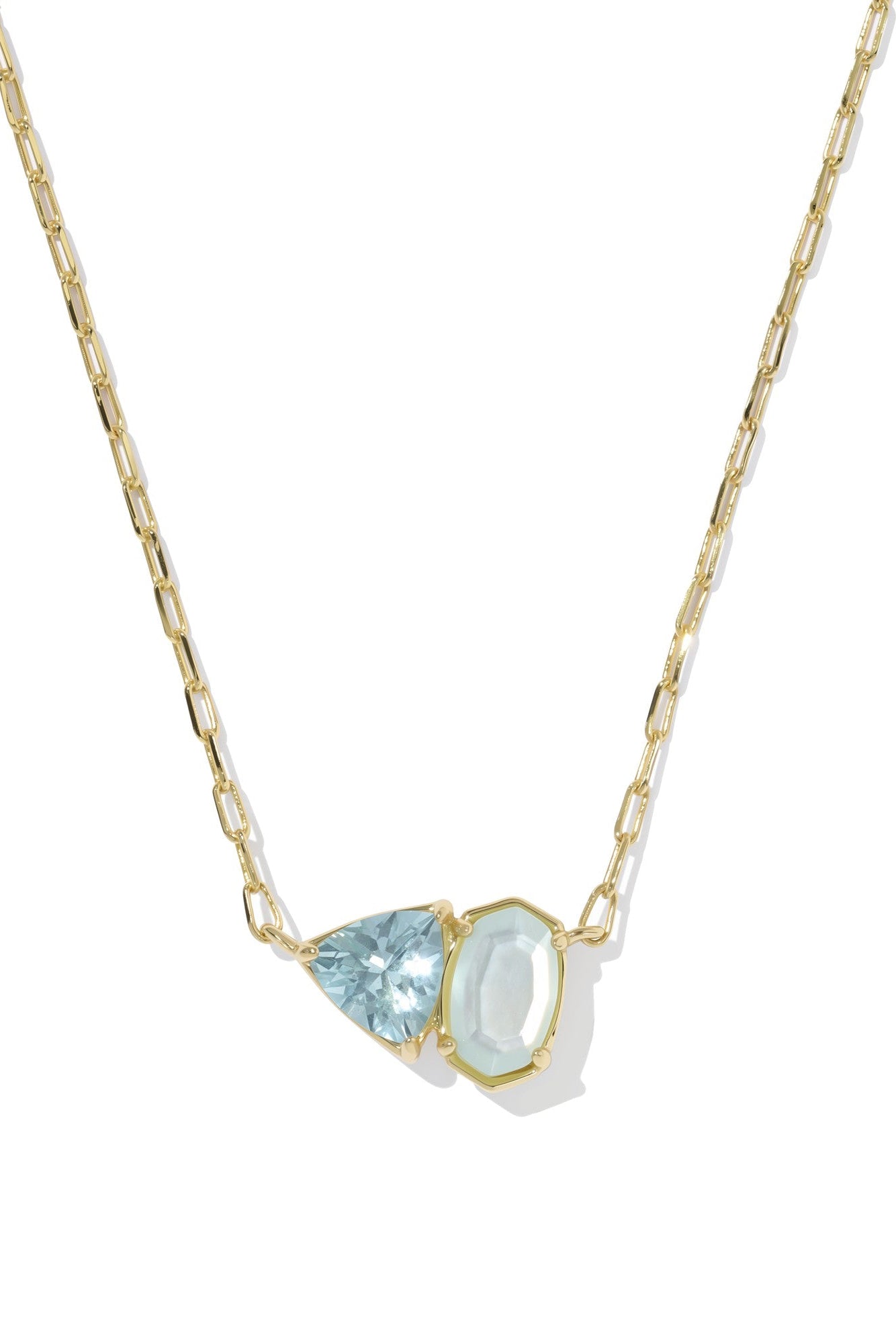 Gold necklace with a pendant featuring a two blue gemstones on a white background
